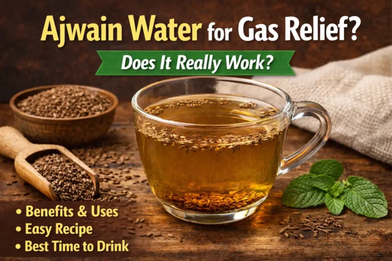 Ajwain water for gas relief in a glass cup with carom seeds on wooden background