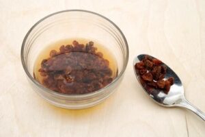 Raisins soaked glass bowl